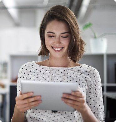 girl smiling while using banking features